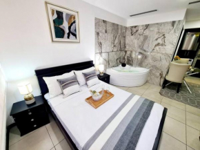 Ecusuites Habitación VIP con Jacuzzi Hidro, Guayaquil